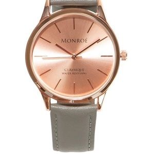 Brand new never worn Monroe pink face and gray leather watch